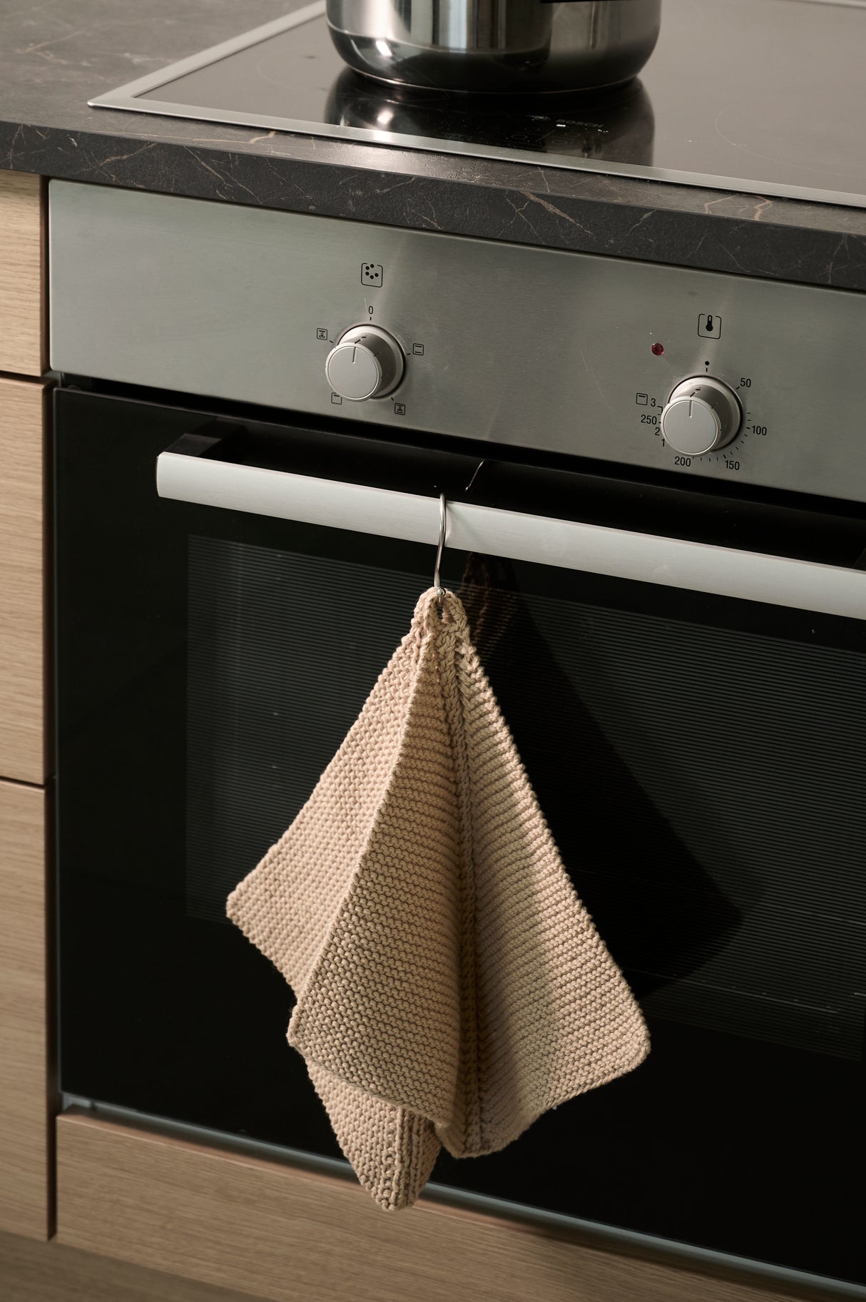 Dominostrikkede grydelapper