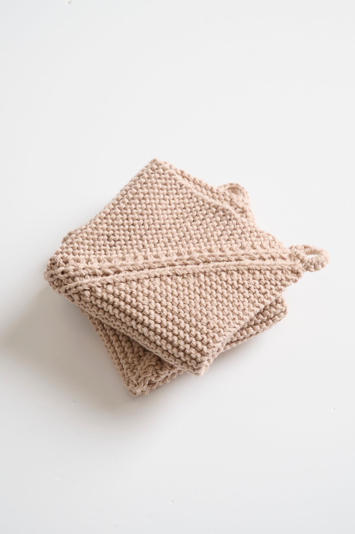 Dominostrikkede grydelapper