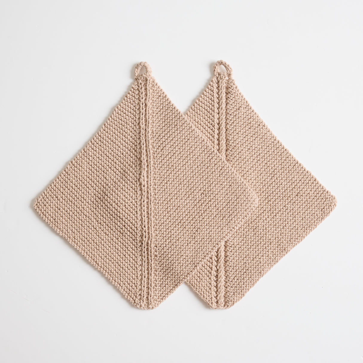 Dominostrikkede grydelapper