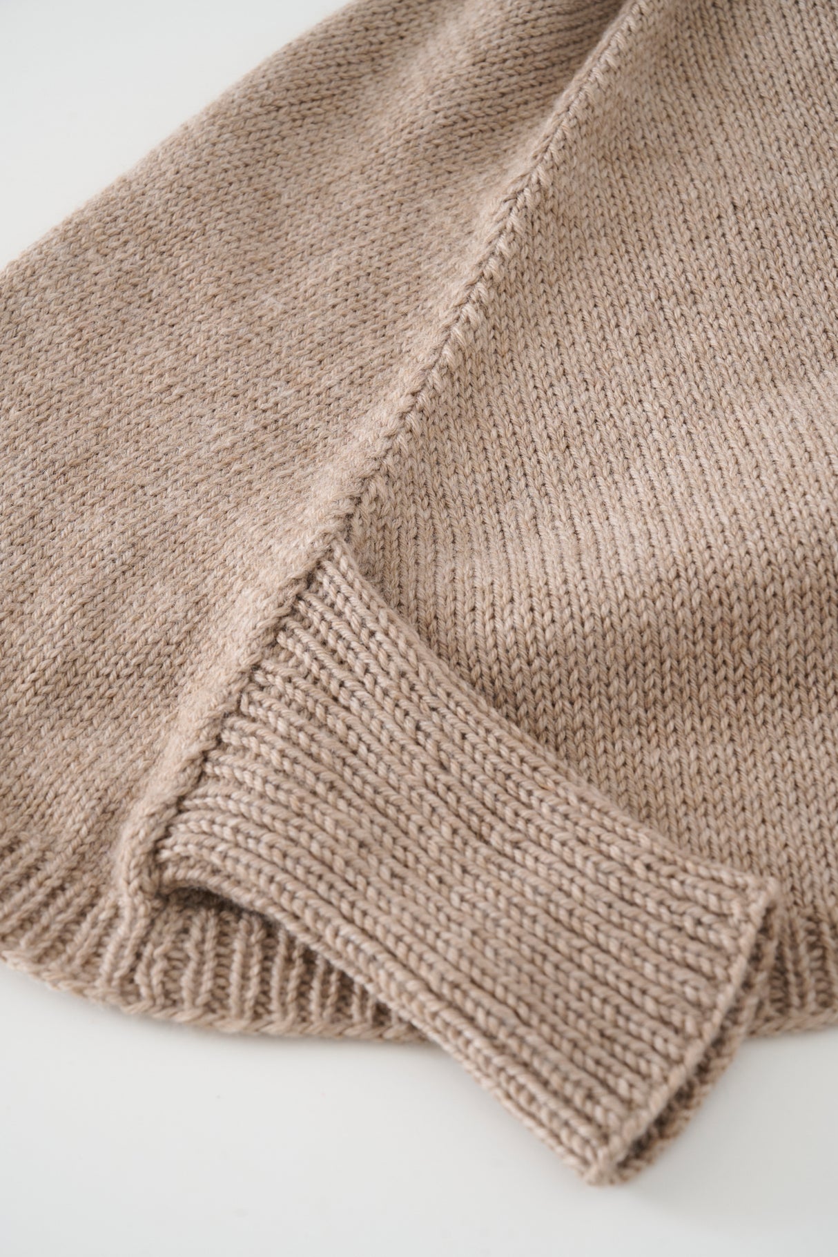 Poncho med ærmer Opskrift