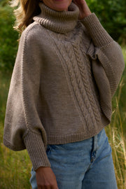 Poncho med ærmer