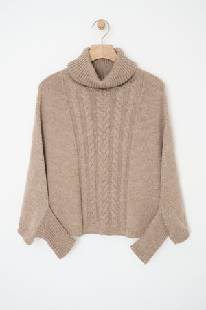 Poncho med ærmer Opskrift