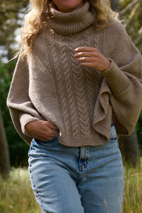 Poncho med ærmer